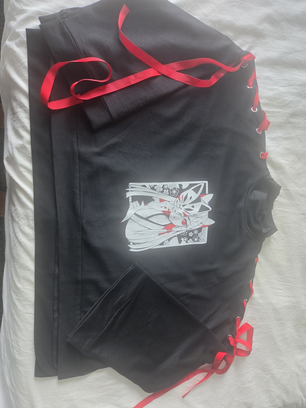 Black Graphic Pullover with Red Ribbon Lacing
